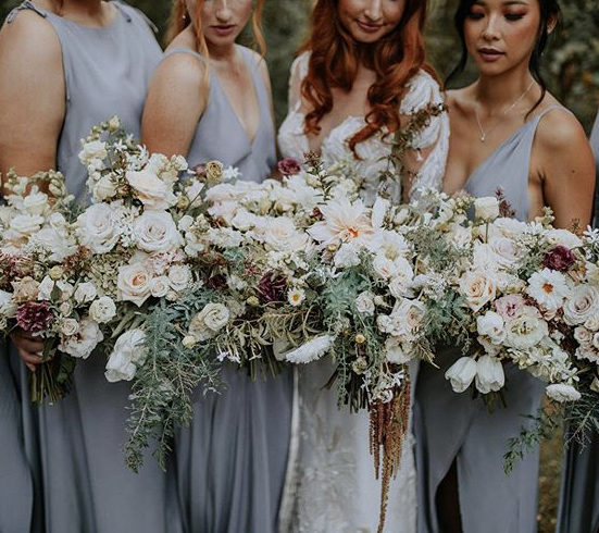 Bride and Bridesmaids photography with bridal flowers