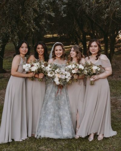 Wedding photography with bridesmaids and bridal flowers