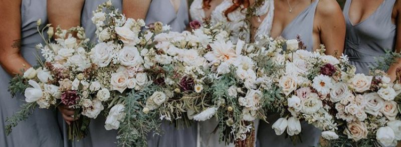 Bride and Bridesmaids photography with bridal flowers